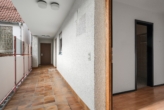 Laubengang - Vielseitig nutzbare Wohnung mit TG-Stellplatz