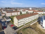 Ansicht - Investition mit Zukunft: Mehrfamilienhaus mit 18 Wohnungen, 7 Garagen und 10 Stellplätzen