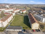 Ansicht - Investition mit Zukunft: Mehrfamilienhaus mit 18 Wohnungen, 7 Garagen und 10 Stellplätzen