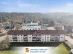 Ansicht - Investition mit Zukunft: Mehrfamilienhaus mit 18 Wohnungen, 7 Garagen und 10 Stellplätzen