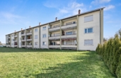 Ansicht - Investition mit Zukunft: Mehrfamilienhaus mit 18 Wohnungen, 7 Garagen und 10 Stellplätzen